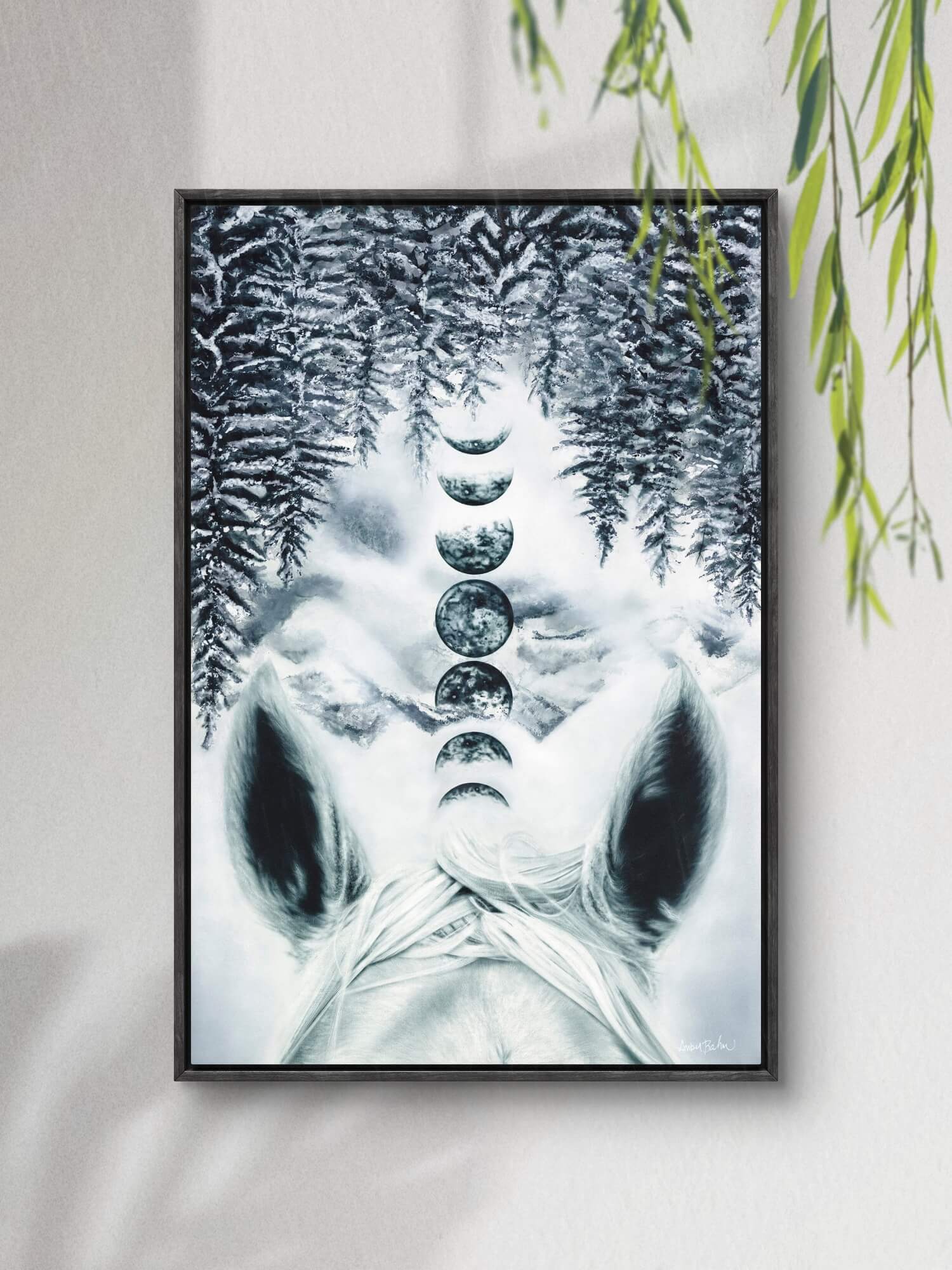 framed canvas art print of a painting of horses ears, moon phases and mountain forest landscape