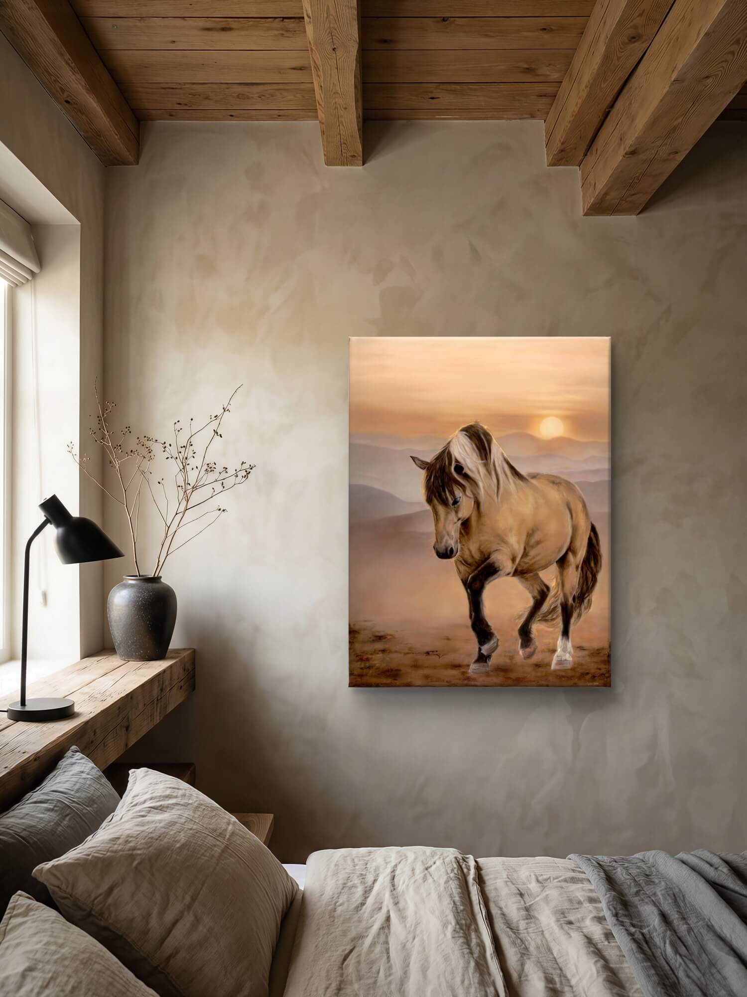 canvas print of a horse in front of a glowing sunset hanging in a contemporary decorated bedroom with wooden beams on the ceiling